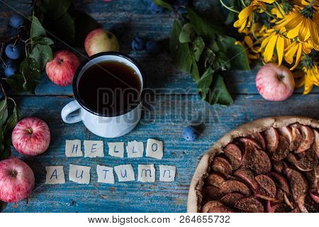 Apple Pie On Wooden Blue Rustic Background. Hello Autumn Picture. Apples, Tea In A Metal Countre Cup