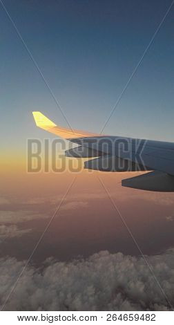 Maledives From Plane In The Water And Sun Spot