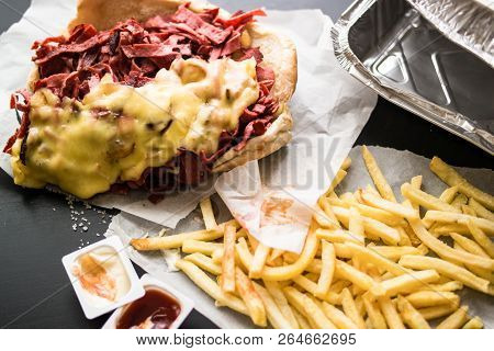 Kumru Sandwich With Sausage, Ham, Melted Cheese And Potatoes, (fast Food Concept.)