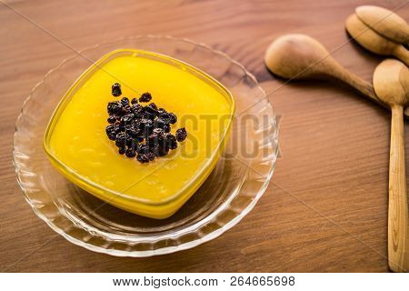 Turkish Traditional Dessert Zerde Pudding With Raisin.