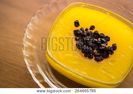 Turkish Traditional Dessert Zerde Pudding With Raisin.