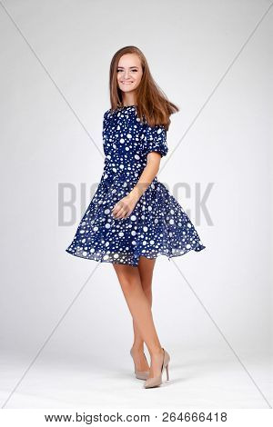 Beautiful Young Girl Standing In A Dress, Dancing, High Heels, Full-length, Spinning Around, Laughin