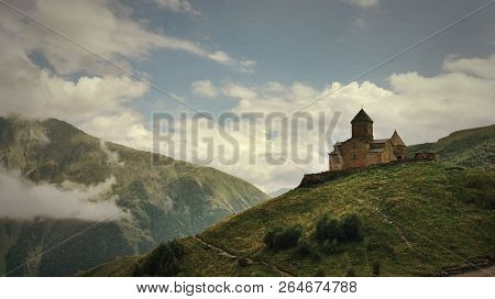 Church In Hight Kaukaz Mountain In Yellow