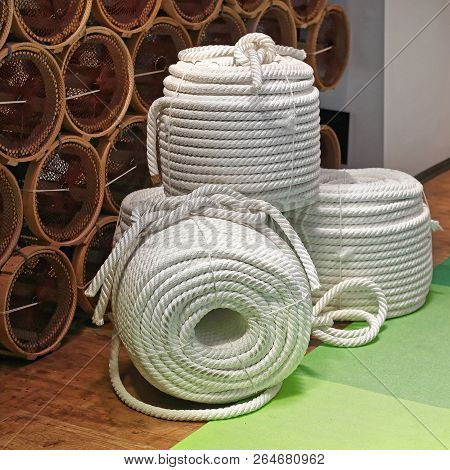 Thick New White Ropes Rolled In Coils