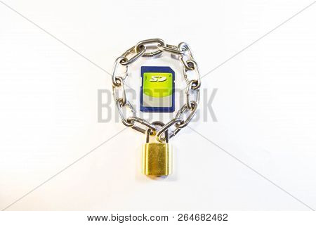 Sd Memory Card Protected By A Lock With A Chain