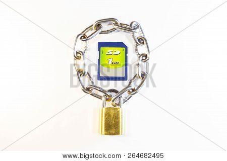 Sd Memory Card Protected By A Lock With A Chain