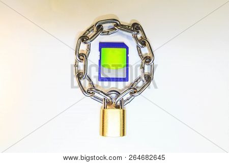 Sd Memory Card Protected By A Lock With A Chain