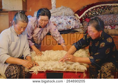 Harhorin, Mongolia - August 20, 2006: Unidentified Senior Mongolian Women Produce Felt In Harhorin, 