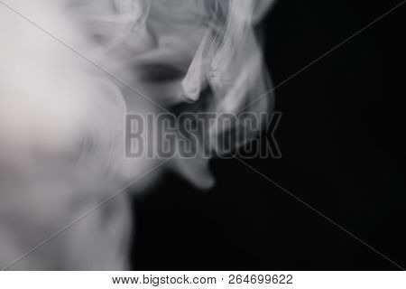 Cigarette Smoke On Black Background Detailed Close-up