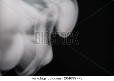 Cigarette Smoke On Black Background Detailed Close-up