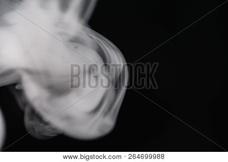 Cigarette Smoke On Black Background Detailed Close-up