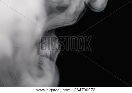 Cigarette Smoke On Black Background Detailed Close-up
