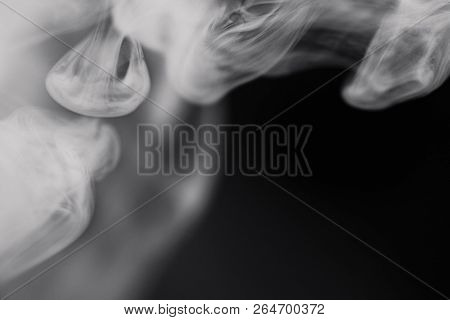 Cigarette Smoke On Black Background Detailed Close-up