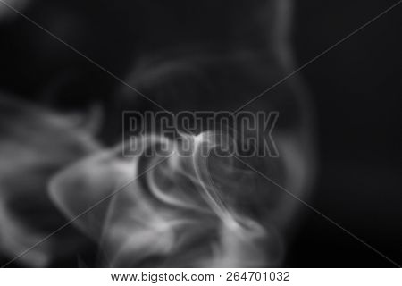 Cigarette Smoke On Black Background Detailed Close-up