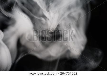 Cigarette Smoke On Black Background Detailed Close-up