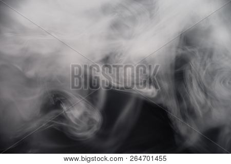 Cigarette Smoke On Black Background Detailed Close-up