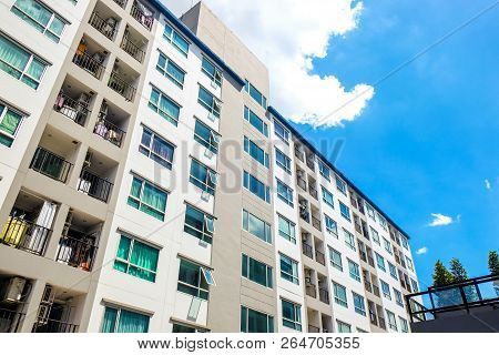 Modern Condominium Building Real Etate In City With Blue Sky