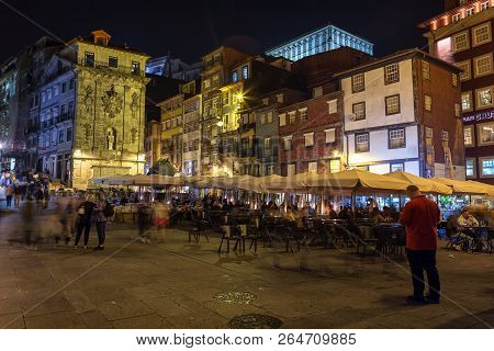 Porto 29 September, 2018: Tourists Walk Along The Night Streets Of Porto, Cais Da Ribeira. Near Brid