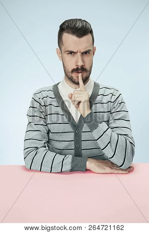 Shhhhh . Man Calling To Silence Or Telling A Secret. Funny Model Whispering About Something. Express