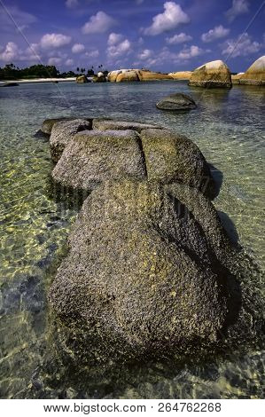 View Of A Group Of Big Stones On The Tanjung Tinggi Beach From Island Belitung/indonesia/