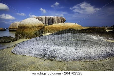 View Of A Group Of Big Stones On The Tanjung Tinggi Beach From Island Belitung/indonesia/