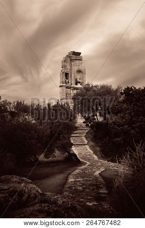 Philopappos Monument at sunrise with cloud, Athens, Greece