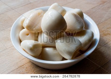 Pickled Garlic Pickles In Bowl. Organic Food.