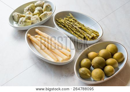 Pickled Vegetables Green And White Asparagus, Artichoke Heart And Unripe Green Almond Pickles In Pla