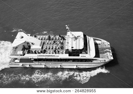 Barcelona, Spain - March 30, 2016: Pleasure Boat Visio Submarina Trimar With People On Deck In Sea. 