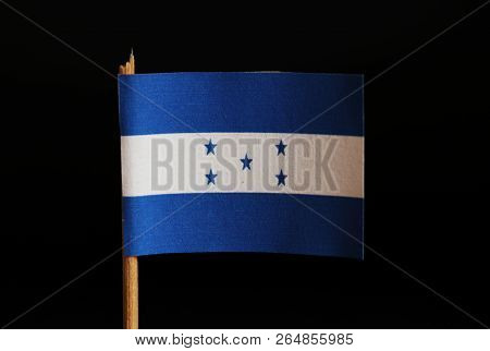 A Official Flag Of Honduras On Toothpick And On Black Background. Honduras Is Located In Central Ame