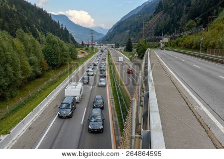Vehicles Waiting In Line For Entering Gotthard Tunnel On Switzerland
