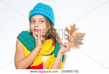 Autumn Bucket List For Children. Girl Cute Face Wear Knitted Autumn Hat And Scarf Hold Leaves White 