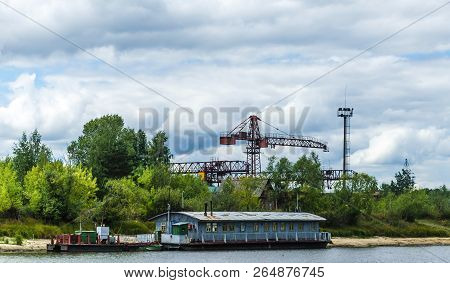 An Old Abandoned Large Pleasure Boat Wooden Boat Standing On The Water Of The River Pripyat Near The