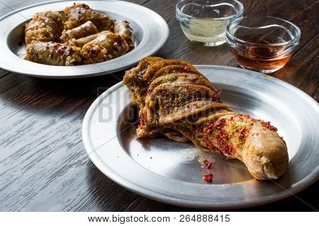 Turkish Food Minced Meat And Rice Stuffed Tripe Sirdan / Shirdan Dolma And Mumbar Dolmasi