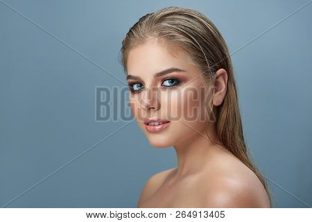 Beautiful Young Nude Girl Looking At Camera. Close Up Of Blond Pretty Woman With Professional Make U