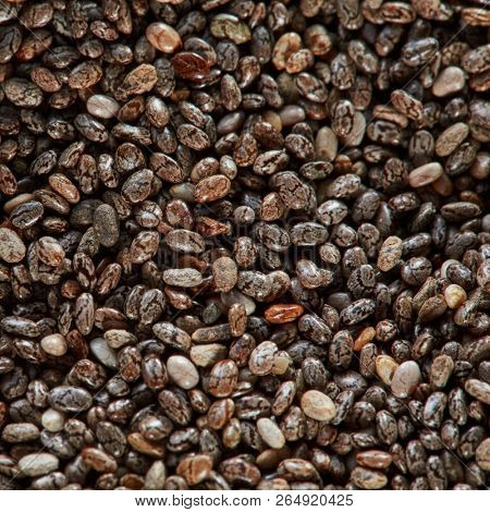 Uncooked linen seeds as a background. Close up, top view, high resolution product. Healthy superfood Concept. Top view.