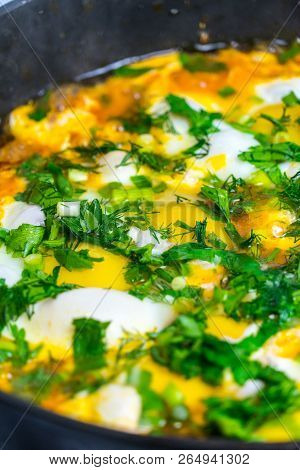 Cook Shakshuka On A Gas Stove In A Frying Pan.