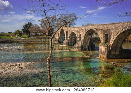 Medieval Bridge Over River Arahthos In Arta, Greece