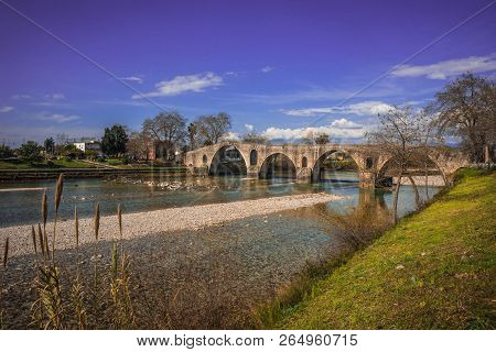 Medieval Bridge Over River Arahthos In Arta, Greece