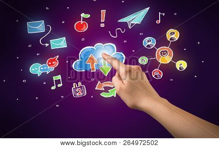 Female hand toucing mixed media icons with purple background