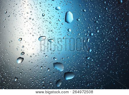 Abstract Water Drop Blue Light Spot Background Close Up