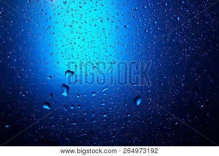 Abstract Water Drop Blue Light Spot Background Close Up