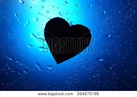 Abstract Water Drop Background Blue Light Spot Heart Silhouette Close Up
