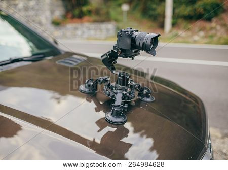 Camera Gimbal On The Car Steadicam Keeps On Suckers On The Auto Car