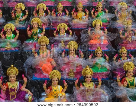 Statues of godess Lakshmi displayed for sale during festival of Diwali. Handcrafted Laxmi idols for Diwali celebration are ready to sell.