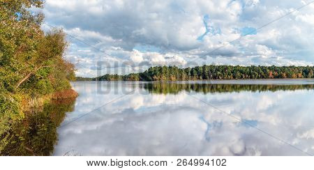 A Panoramic Autumn View Of Prospertown Lake In Monmouth County New Jersey.