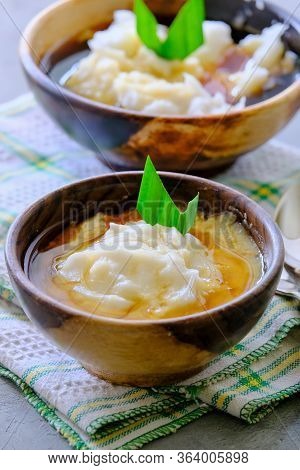 Bubur Sumsum. Javanese Dessert Porridge Of Rice Flour, Coconut Milk With Palm Sugar Syrup. Served In