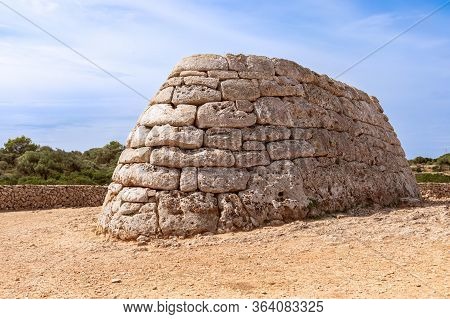 View Of La Naveta Des Tudons - The Most Famous Of Menorca’s Megalithic Sites.