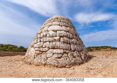 View Of La Naveta Des Tudons - The Most Famous Of Menorca’s Megalithic Sites.
