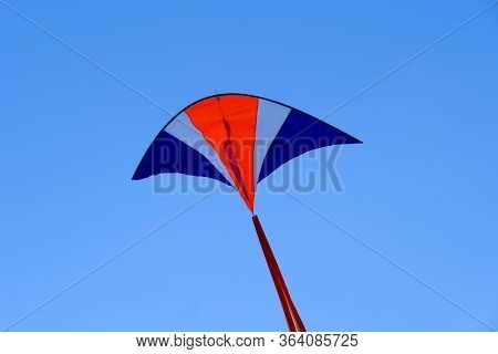 Children's Toy. Children Fly A Flying Kite.
Background Image For Web Design.
